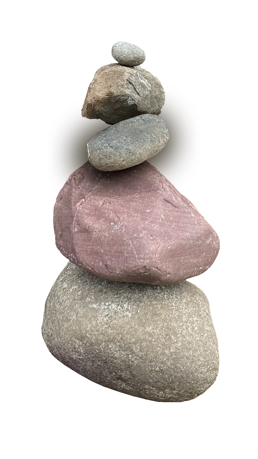 a stack of five rocks with the middle rock highlighted